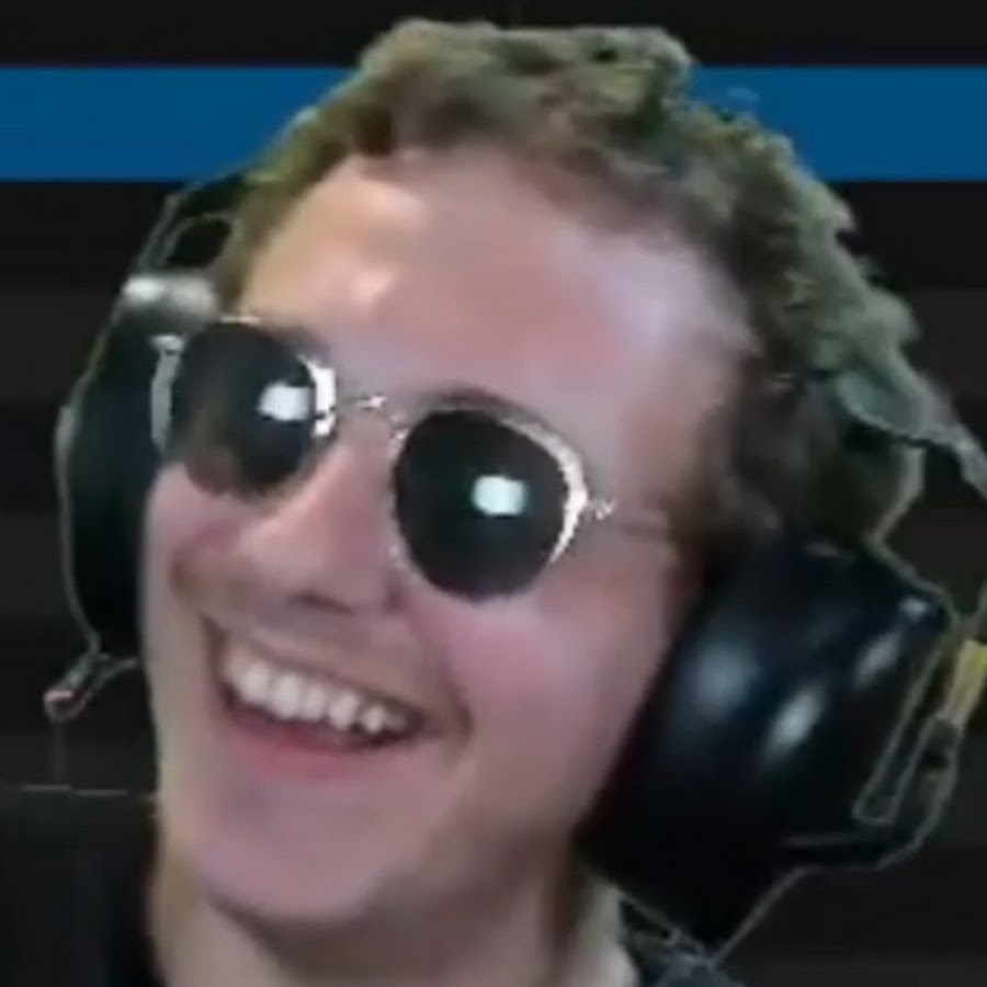 Brad wearing sunglasses and headphones