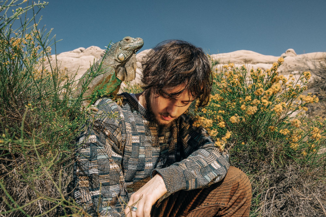 Quadeca with his signature lizard